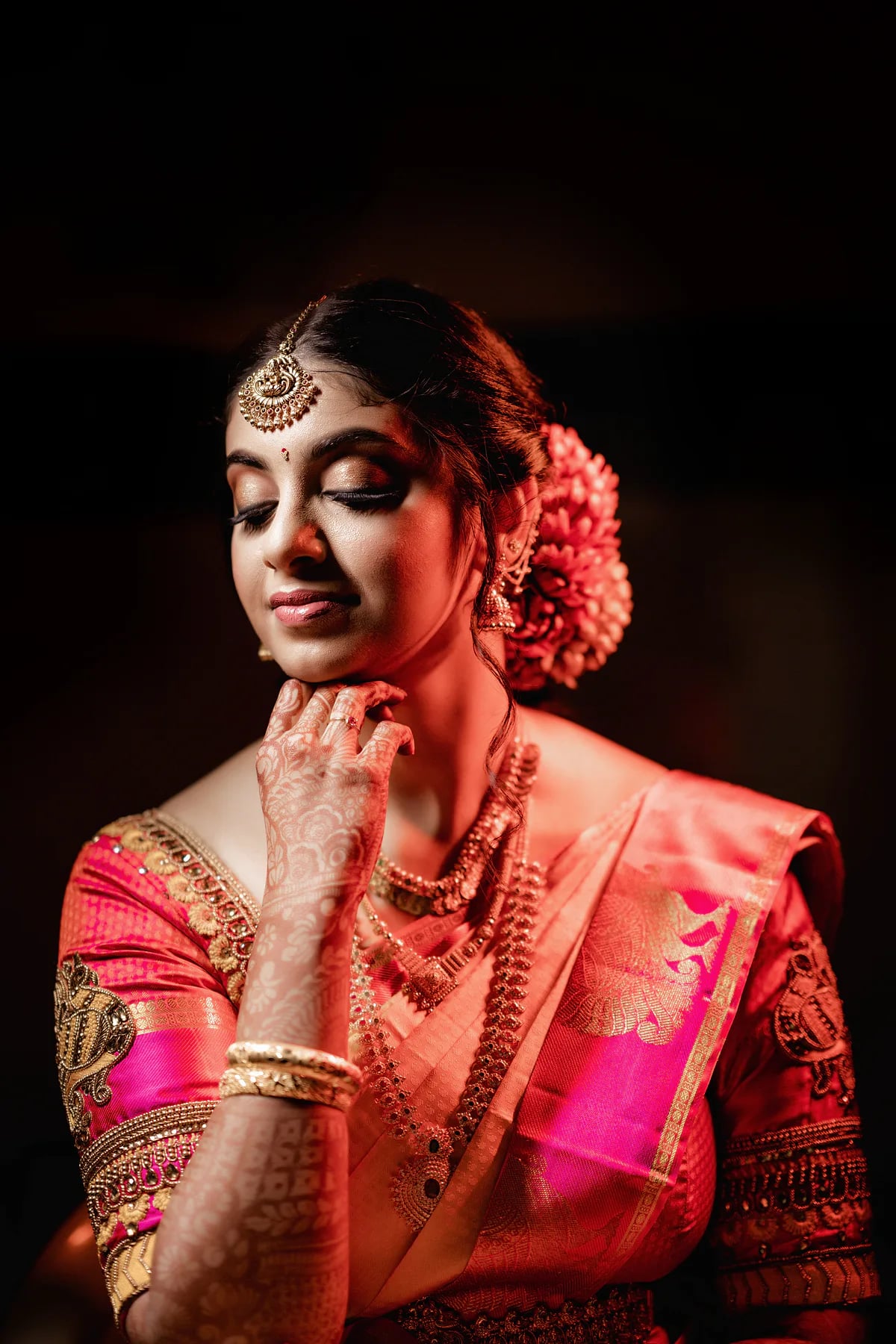 Bridal makeup Bangalore — HD airbrush base, defined brows, and rose-nude lip by Dejavu